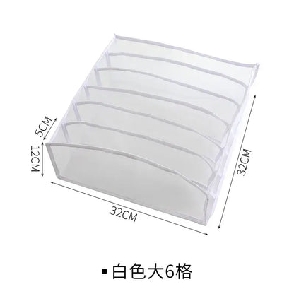 White translucent mesh organizer box set with six compartments for underwear storage in bedroom wardrobe