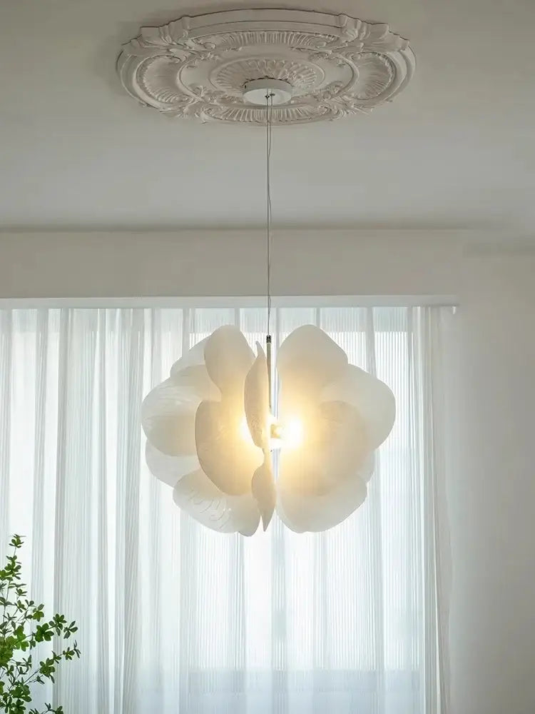 White paper flower butterfly pendant light with layered petals and warm glow ideal for elegant bedroom decorbites pendant light