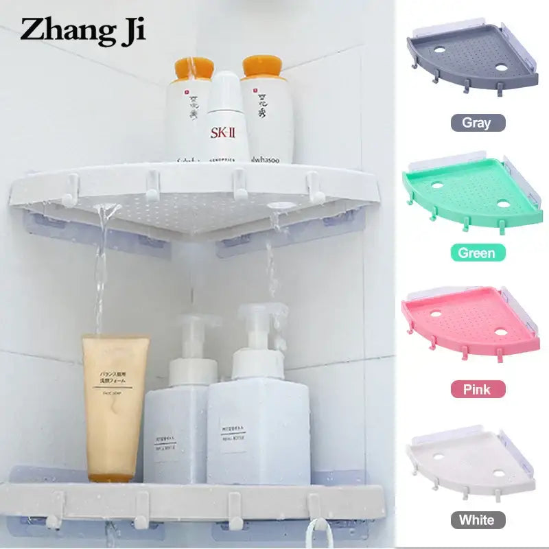 White plastic corner bathroom shelf organizer caddy with perforated top and hook attachments for bathroom use