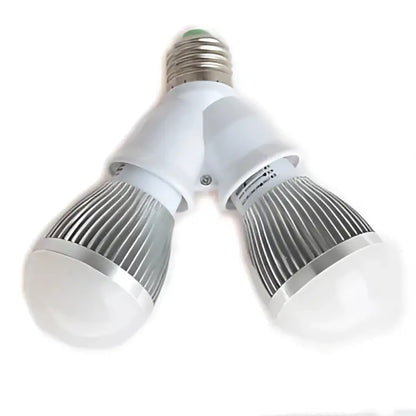 White plastic dual e27 bulb socket converter with silver metallic base and frosted glass bulbs for kitchen lighting