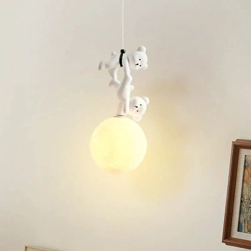 White plush bear pendant lamp featuring two bears climbing a glowing moon for a nursery room or bear nursery room