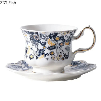 Elegant white porcelain classic tea cup with navy and gold floral pattern and gold accented curved handle