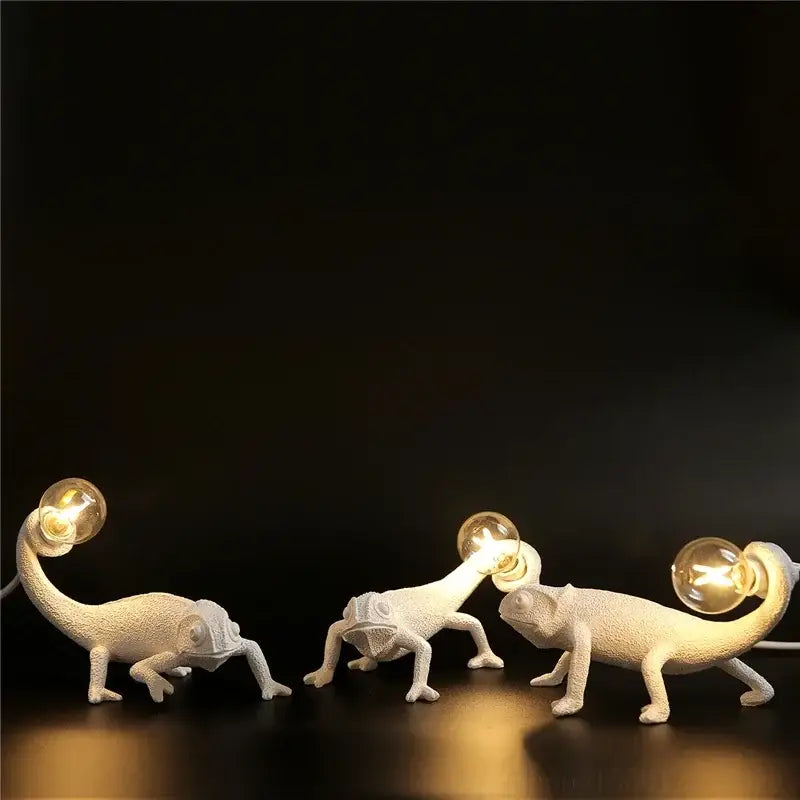Three white decorbites chameleon night lights with textured resin bodies and exposed filament bulbs for bedroom reading