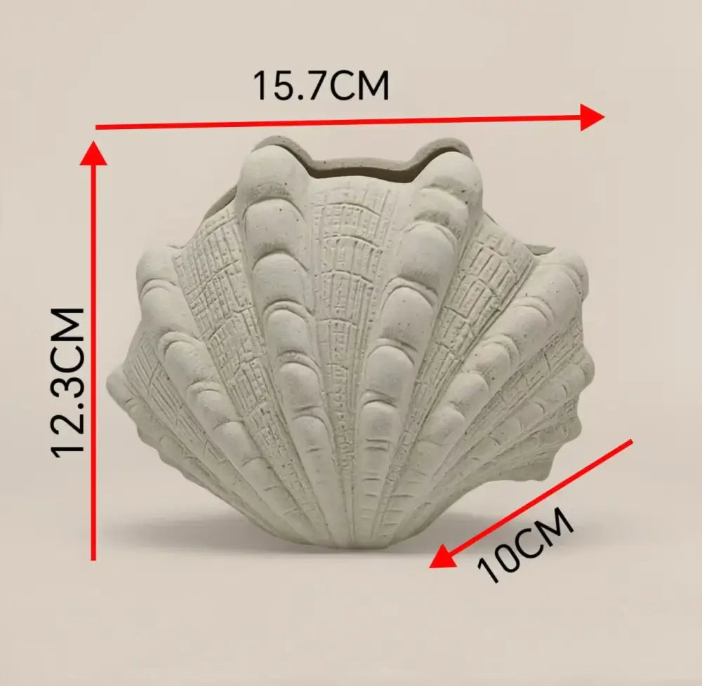 Gray concrete ceramic clam shell vase with detailed ridged texture and scalloped edges for living room decorbites decor