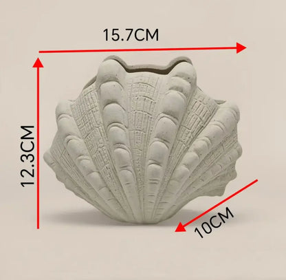 Gray concrete ceramic clam shell vase with detailed ridged texture and scalloped edges for living room decorbites decor