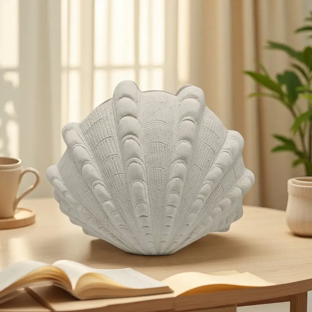 White ridged ceramic clam shell vase with intricate textured detailing for living room decor by decorbites ceramic clam