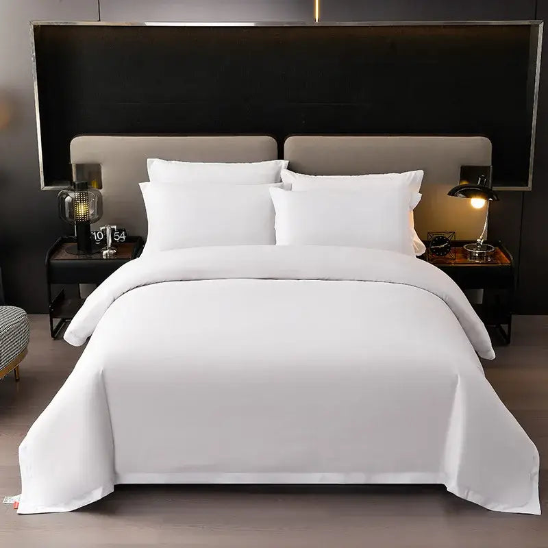 White satin bedding set with red and black trim elegantly draped in a modern decorbites cozy solid color bedroom