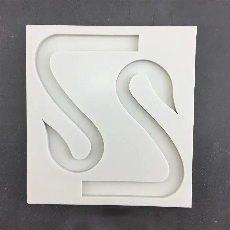 White silicone cake mold with raised swan neck design for decorbites 3d wings cake decoration use