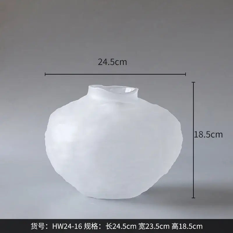 White textured ceramic glass pleats vase with smooth matte finish and rounded organic shape for living room decor