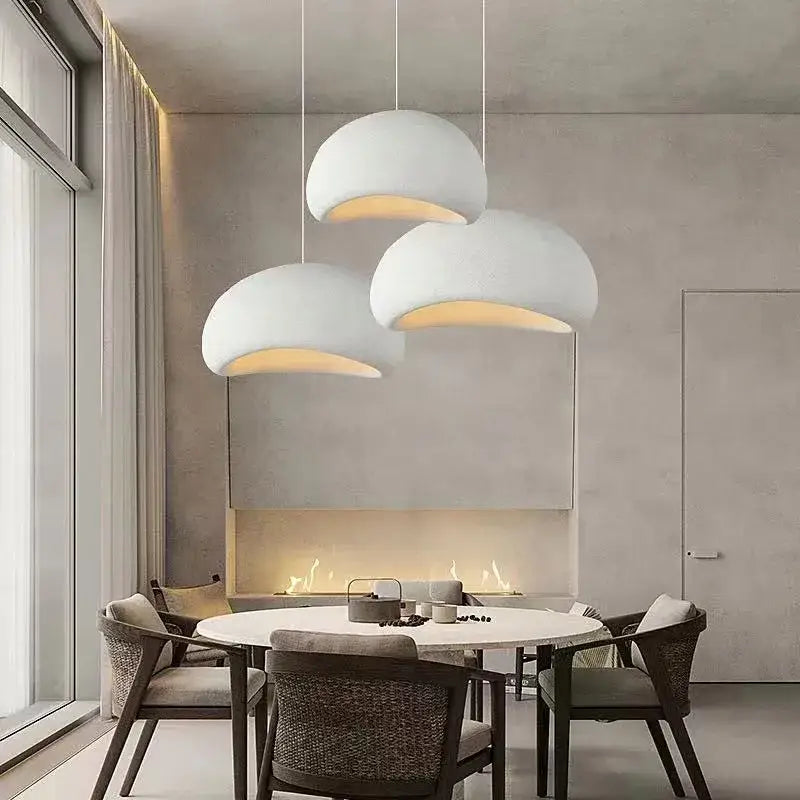 Three white dome-shaped pendant lamps handmade wabi sabi by Decorbites for dining room decor