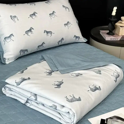 White zebra-patterned quilt set with gray printed zebras on soft decorbites cool silk summer fabric