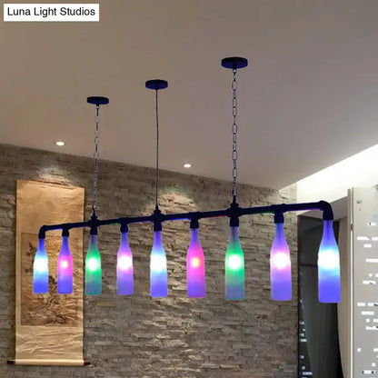 Modern decorbites island pendant light with seven colorful glass bottles on black metal frame and adjustable chain cord length