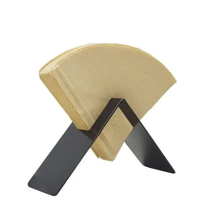 Black metal coffee filter holder with beige paper filters in wood and black decorbites barista filter storage box
