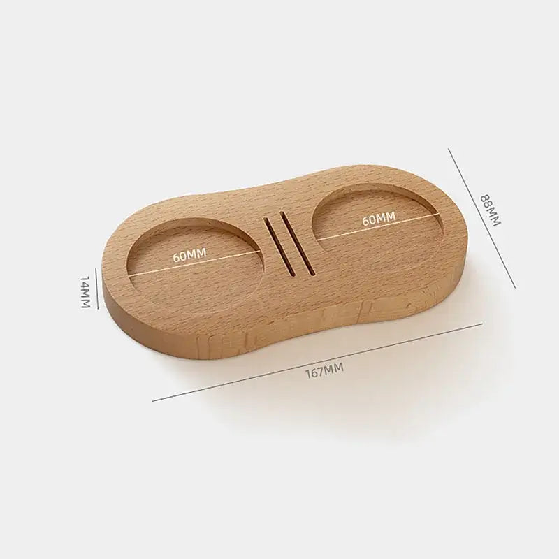 Light brown wooden espresso distributor tamper with dual compartments and stainless steel puck screen slot