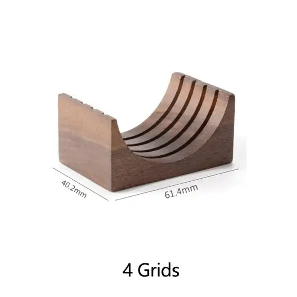 Dark brown wooden filter screen holder with four curved grooves and gray coasters for espresso kitchen use