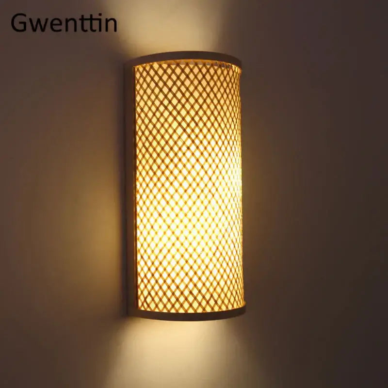 Warm-toned cylindrical bamboo wall lights sconces with woven lattice and dark metal frame for bedroom warm gold glow