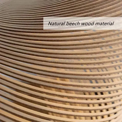 Coiled natural beech wood strips in warm light brown hue forming decorbites birch wood led pendant lamp for dining room decor