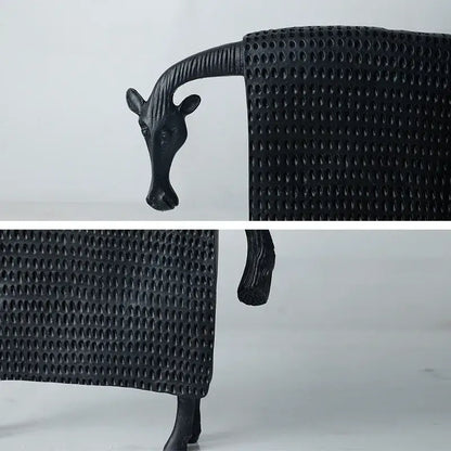 Black metal giraffe-shaped decorative chair with textured surface and sculpted head for resin sculpture figurine decorbites black cow use