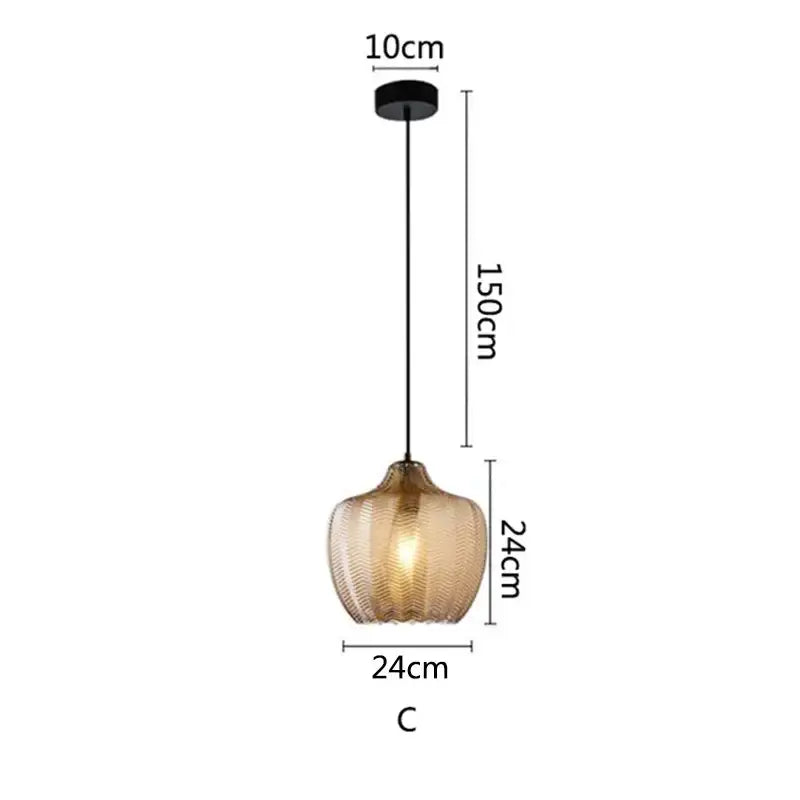 Woven gold glass pendant lights with textured amber shade and black metal hardware for kitchen and dining room