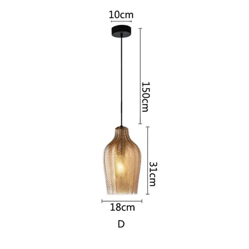 A warm-toned woven gold glass pendant light with black metal mount ideal for kitchen and dining room nordic style pendant lights