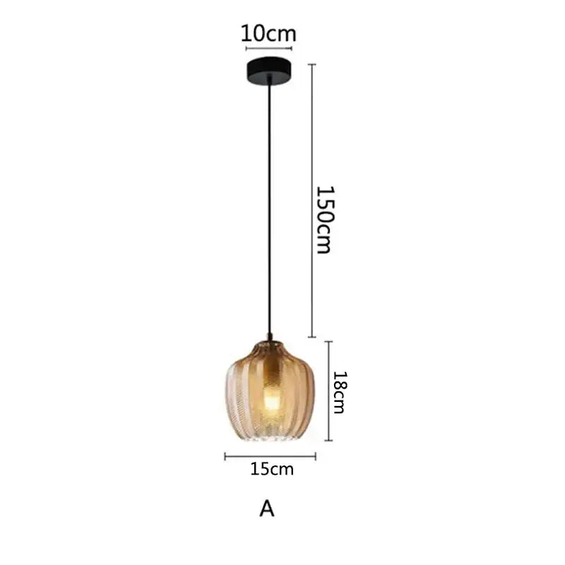 A warm-toned ribbed glass pendant light with black metal chain ideal for kitchen and dining room glass pendant lights