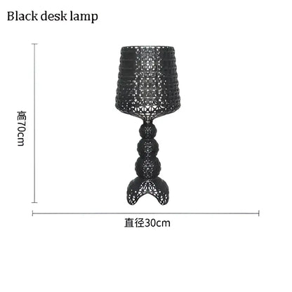 Black floor lamp with woven metal design and cylindrical shade ideal for decorbites acrylic kabuki table or living room decor