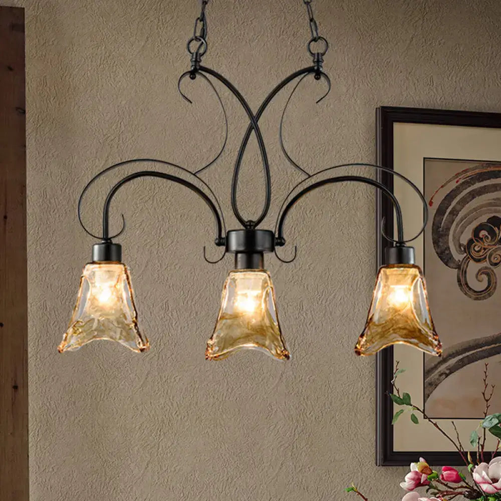 DecorBites black flower island pendant ceiling light with wrought iron frame and three amber textured glass shades