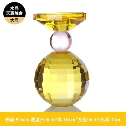 Yellow and pink crystal candle holder with faceted spherical base and diamond top for dining room centerpiece