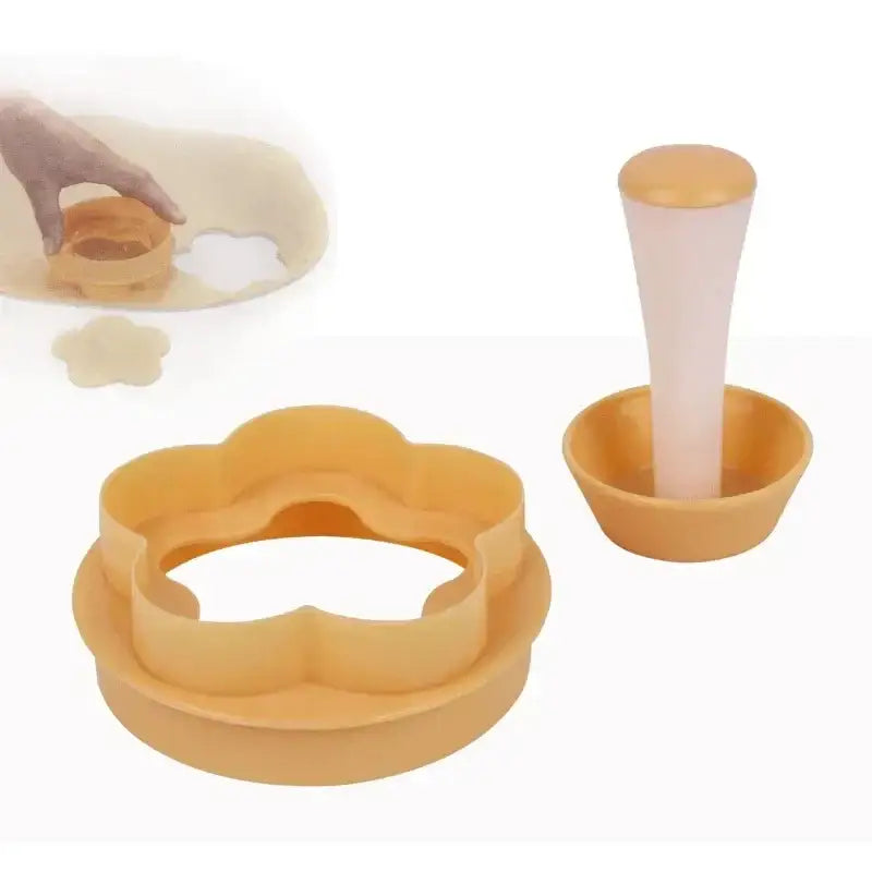 Yellow plastic flower-shaped cookie cutter set with matching press tool in baking tools kit for kitchen use