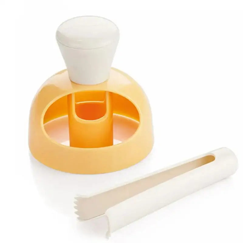 Yellow and white plastic apple corer and fruit cutter in a baking tools kit for kitchen use