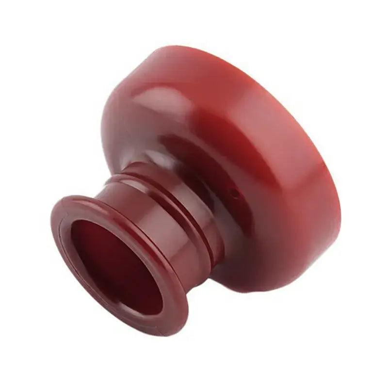 Red glossy plastic suction cup attachment from yellow and white donut cutter baking tools kit for kitchen use