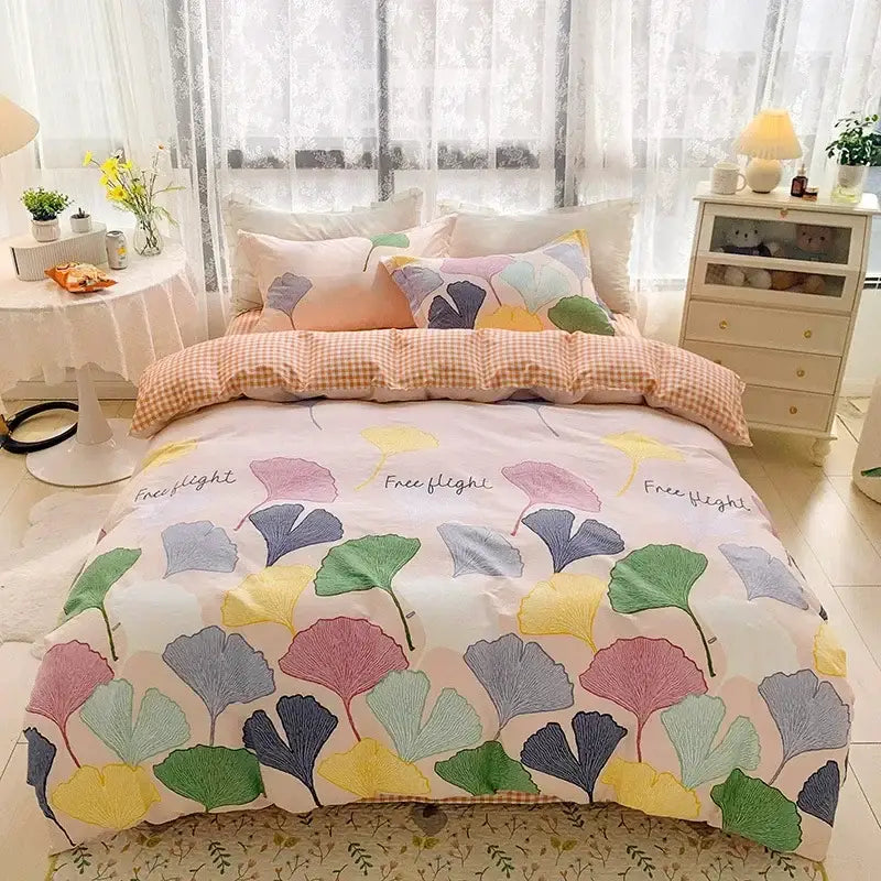 Pastel-colored duvet cover with vibrant ginkgo leaves pattern in green yellow pink and blue on soft white flowers print cotton bedding set for decorbites