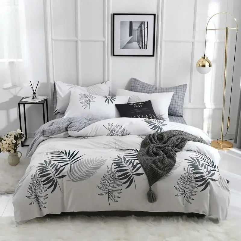 White duvet cover with black and gray palm leaf patterns in yellow and white flowers print cotton bedding set decorbites flowers print