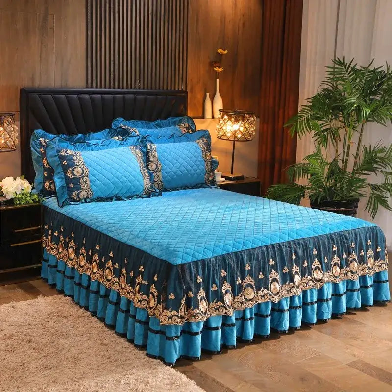 Blue quilted bed skirt with gold and black ornate embroidery in yellow and black decorbites crystal velvet bedspread set
