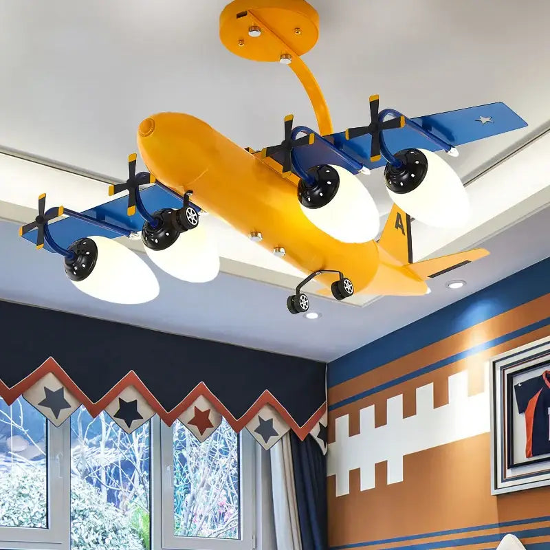 Yellow and blue airplane bluetooth speaker lamp with black propellers and white lampshades for kids room decorbites