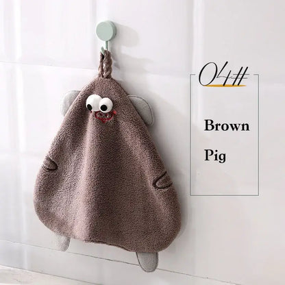 Brown plush cartoon pig hand towel with embroidered eyes and stitched details for bathroom or kitchen decorbites cartoon pig