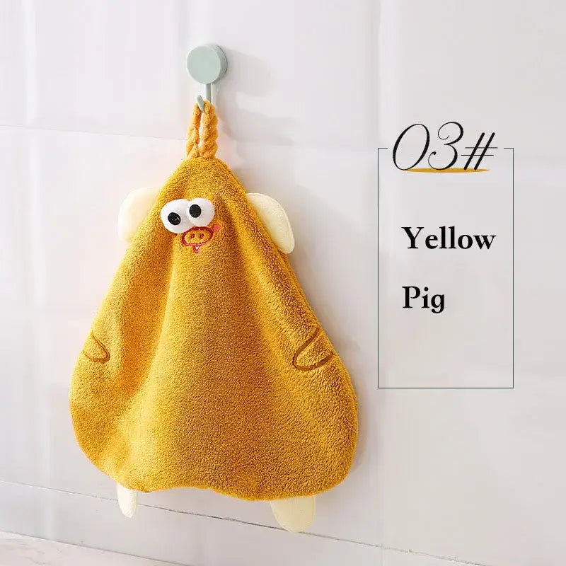 Yellow cartoon pig plush hand towel with embroidered features and soft fabric ears for bathroom or kitchen decorbites cartoon pig