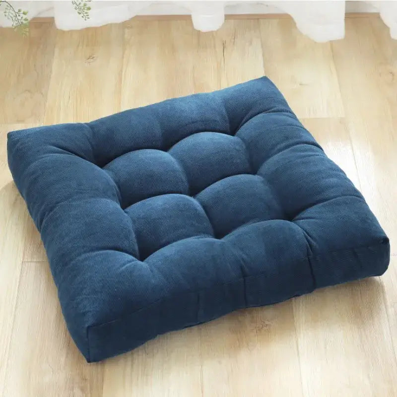 Deep blue corduroy square floor pillow with tufted quilted design for decorbites inyahome square living room use