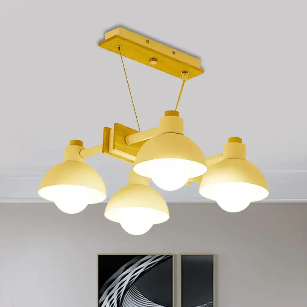 Yellow metal DecorBites dome shade linear chandelier with four dome lampshades and adjustable chain cord length