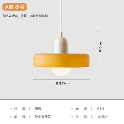 A yellow and olive green nordic canteen chandelier kitchen pendant light with a warm amber glass shade and cream nordic base