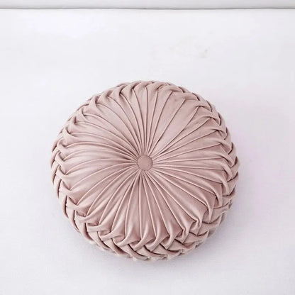 A blush pink velvet throw pillow with circular pleated design ideal for decorbites 3d pumpkin living room decor