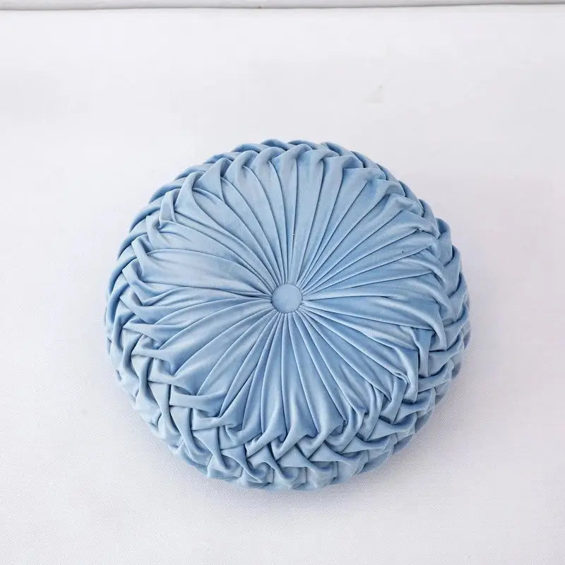A soft light blue velvet throw pillow with circular pleated design and central button for living room decorbites 3d pumpkin decor