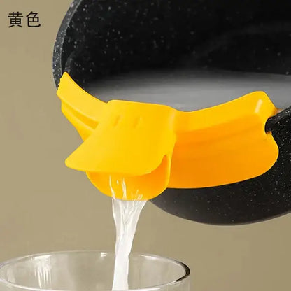Yellow silicone duck beak funnel decorbites duck beak designed for straining while pouring from a pot