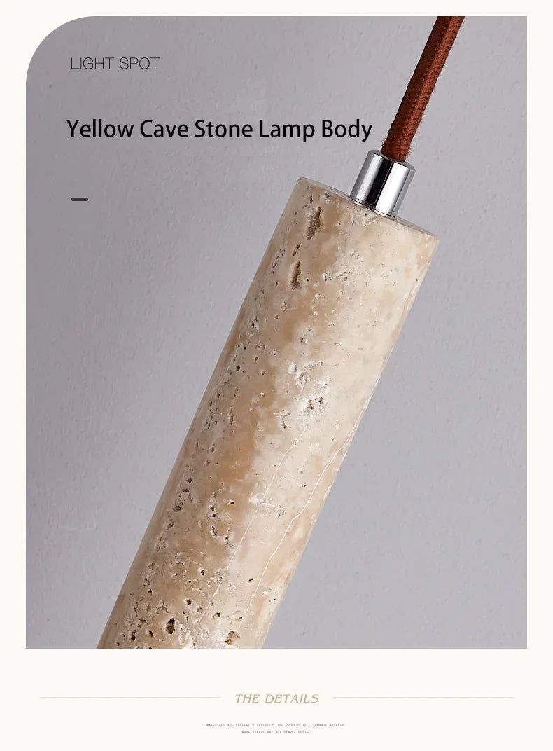 Yellow stone pendant light with cylindrical textured stone body and polished silver metal cap for bedroom use