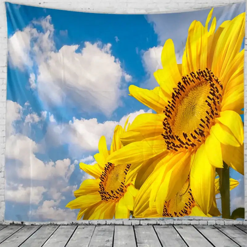 Vibrant yellow sunflower hippie bohemian tapestry with detailed petals and dark centers against bright blue sky for bedroom wall hanging