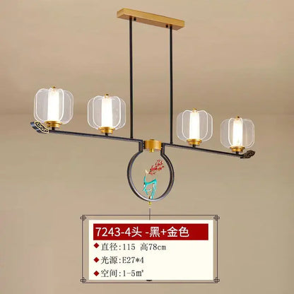 Black and gold modern pendant light with four clear lantern-style glass shades decorbites deer enamel pendant for living room