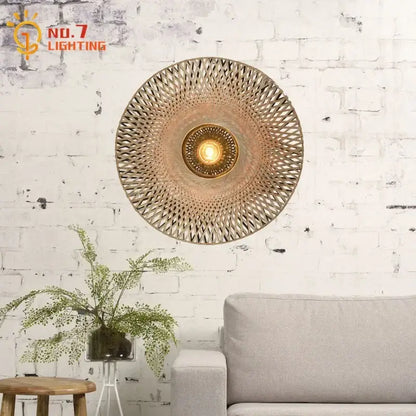 Zen natural bamboo weaving wall lamp with a circular design and warm golden glow for living room wall lamp decor